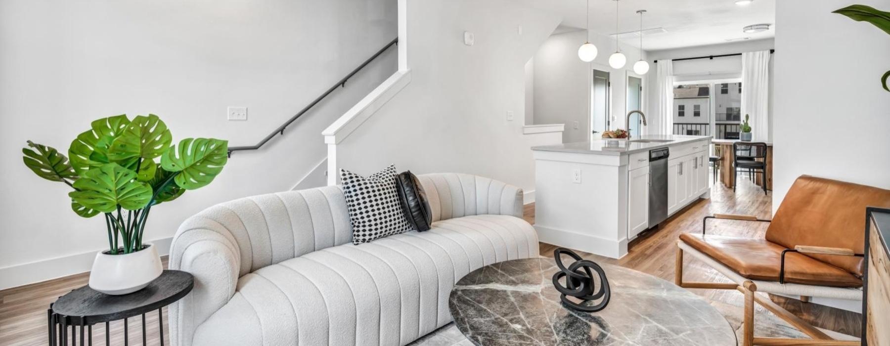 a living room with a couch and a table